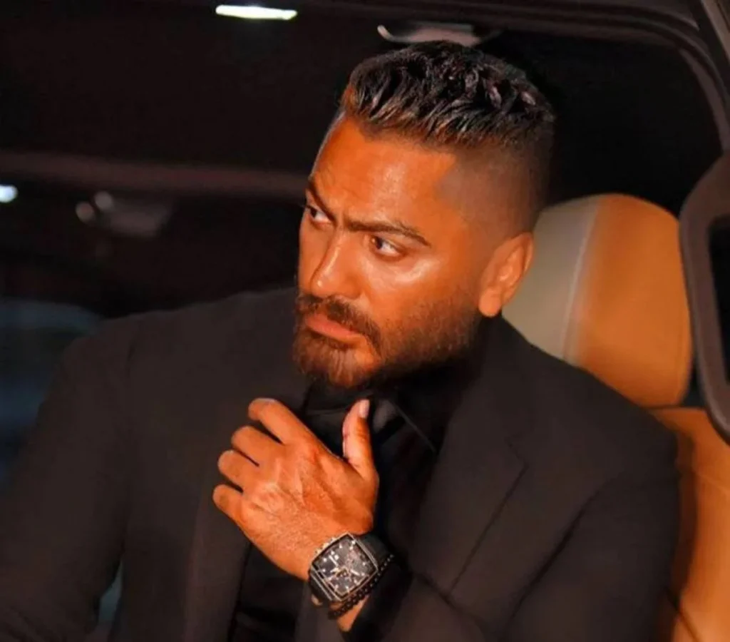 عازف الجيتار الأردني محمود ردايدة ينتقد تامر حسني لادعائه العزف على الغيتار في حفل عيد الأضحى